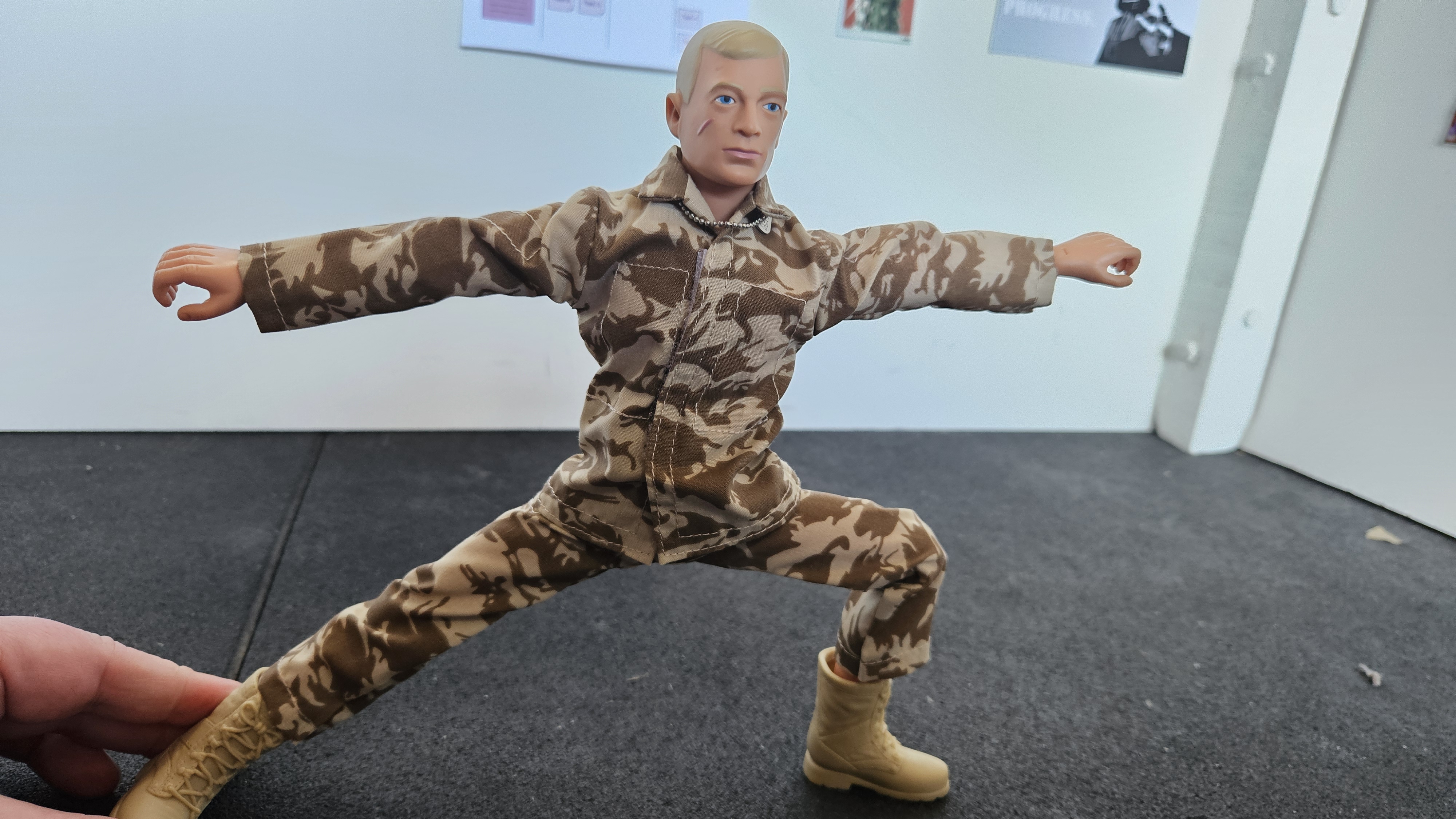 Action Man doing Warrior 2 Pose